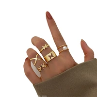 delysia king new creative simple fashion womens jewelry hollow butterfly cross pearl ring 5 piece set