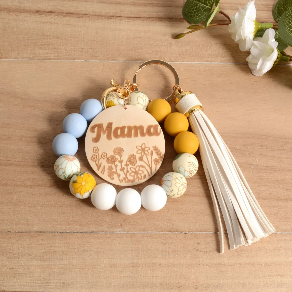 

Boho Daisy Silicone Beaded Mama Wood Disc Wristlet Keychain Mother Day Ideas Bridesmaid Spring Time With Tassel Gift for Women