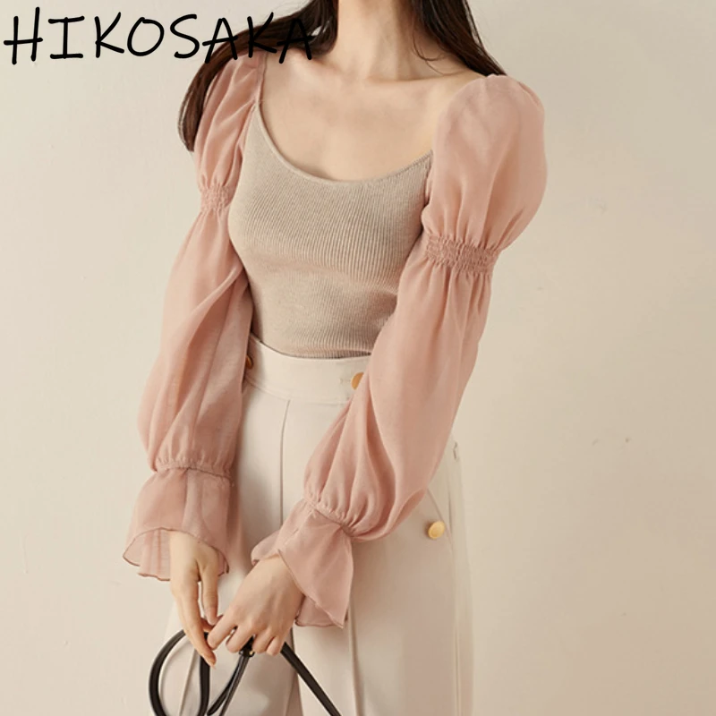 Женский свитер с пышными рукавами-фонариками и воротником-стойкой