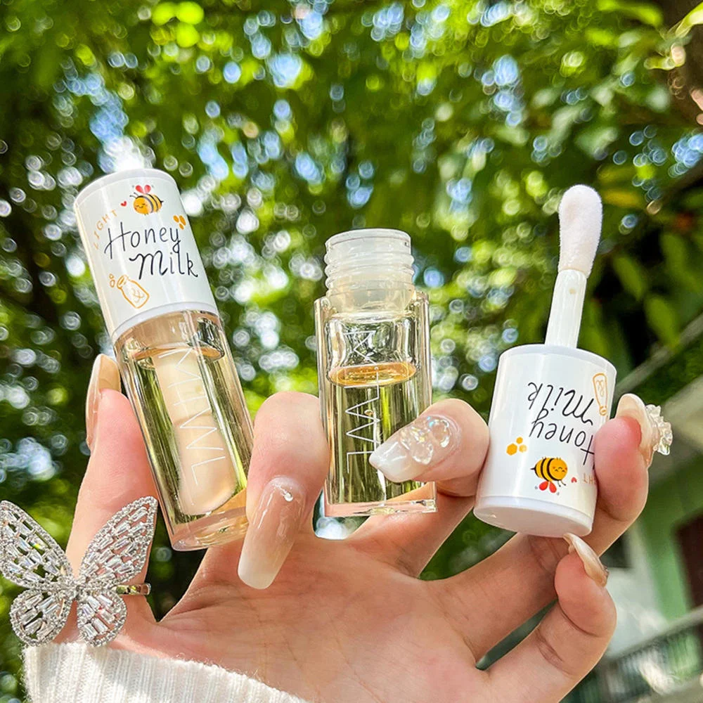 

Kawaii Lip Gloss Honey Peach Lip Oil Long Lasting Non-Sticky Moisturizes Vitamin E Lip Tint Lip Plumper Lip Care Serum Korean