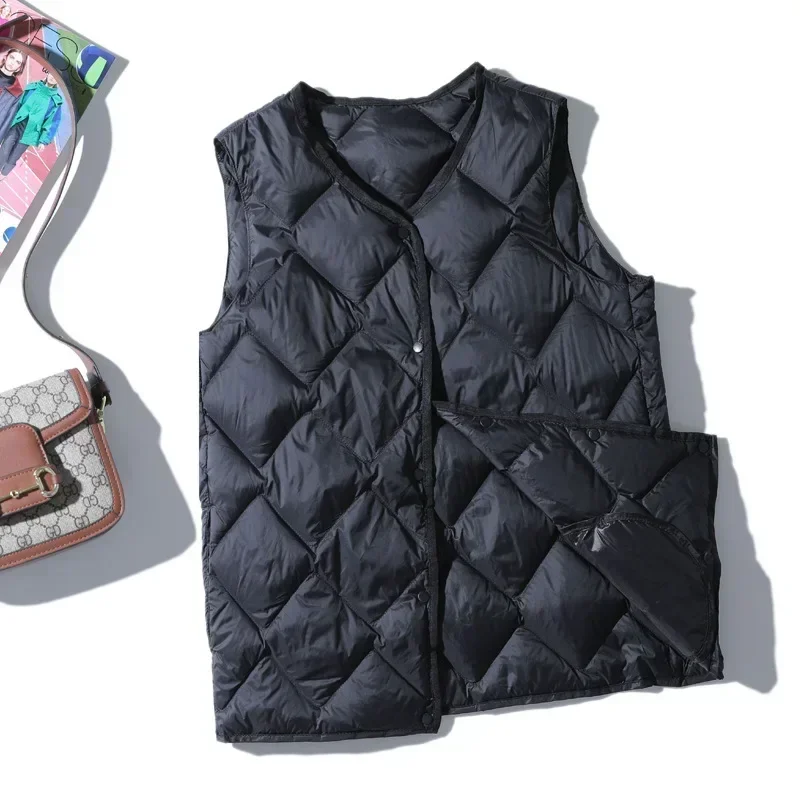 Женский ультратонкий пуховик в корейском стиле с теплой подкладкой и застежкой