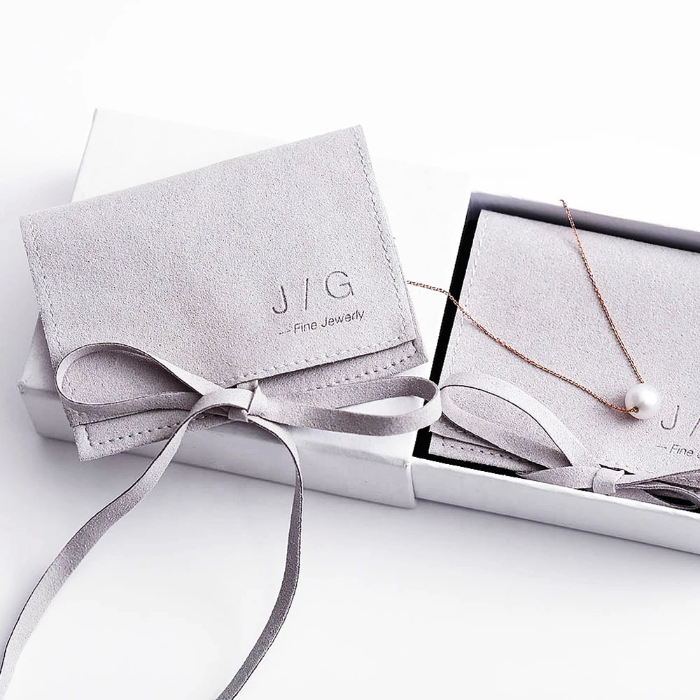 50PCS deboss print luxury custom Logo microfiber Gift Pouch for necklace earrings Jewelry pouch