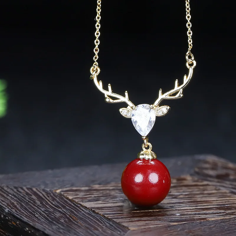 Yilu имеет инкрустированное Cinnabar хрустальное ожерелье женский кулон.