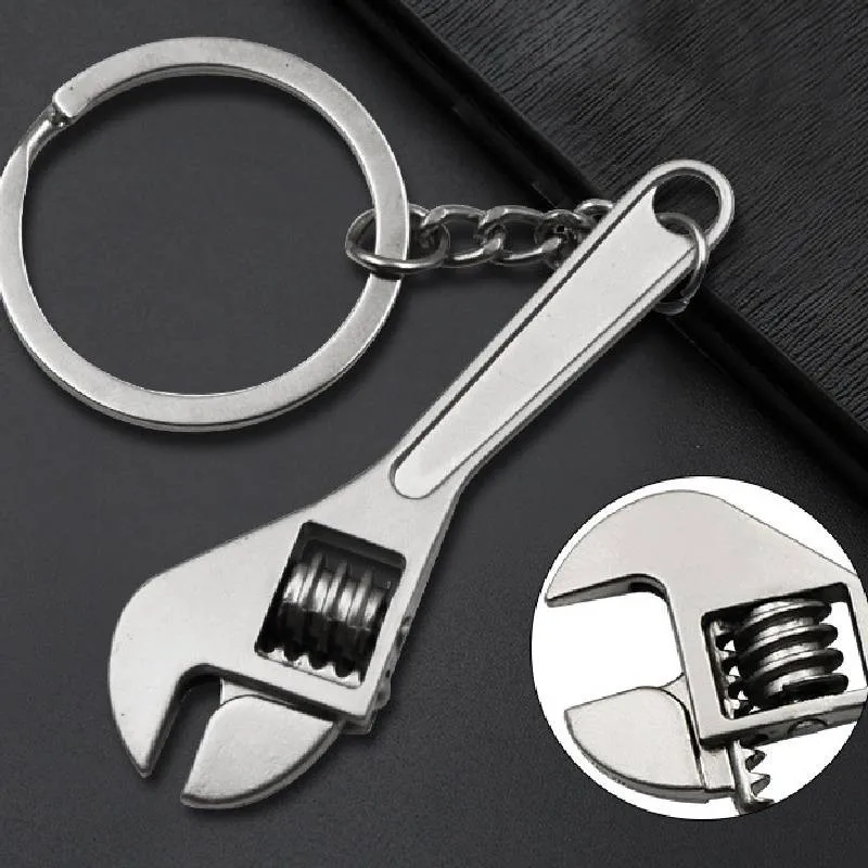 

1PCS Car Metal Wrench Multifunctional Keychain Creative Fashion Gift Silver Compact Keychain Brake Disc Shock Absorber Pendant