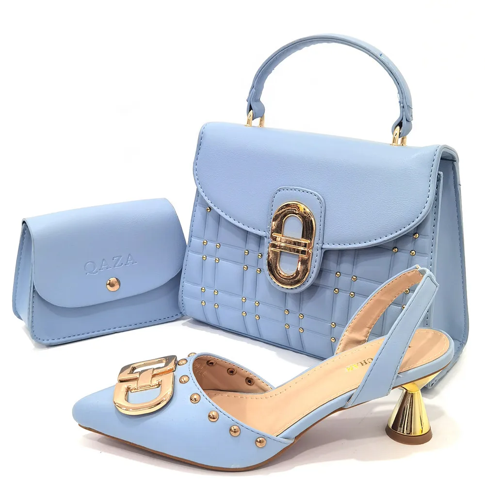 

Заостренный Топ, новейший синий цвет, нигерийский популярный стиль, полый дизайн, элегантный и модный банкет, Женский комплект из обуви и су...