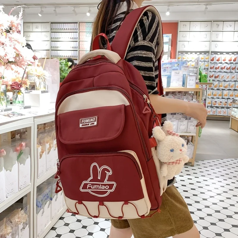 

Large-capacity Middle School Student Backpack Female Trend Color Contrast Splicing Lightening Waterproof Travel Schoolbag