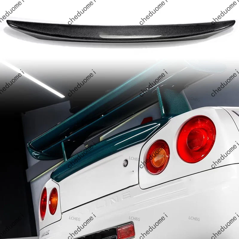 Фото Подходит для Nissan Skyline GTR R34 GTT 1999-2002 годов выпуска. Задний спойлер на крышку багажника из карбона. Аэродинамический элемент для стайлинга автомобиля. №4