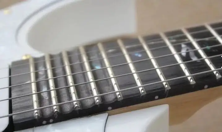 

Wholesale Top quality new Left Handed tree of life inlays 21 to 24 frets scalloped white Electric Guitar with gold hardware 7 V