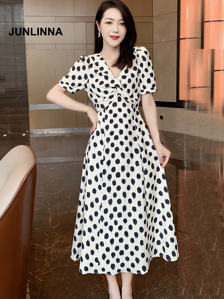 

JUNLINNA Street Fashion Women Dresses V Neck Short Puff Sleeve Polka Dot Printing Midi Vestidos Ruched Sliming Party Wear