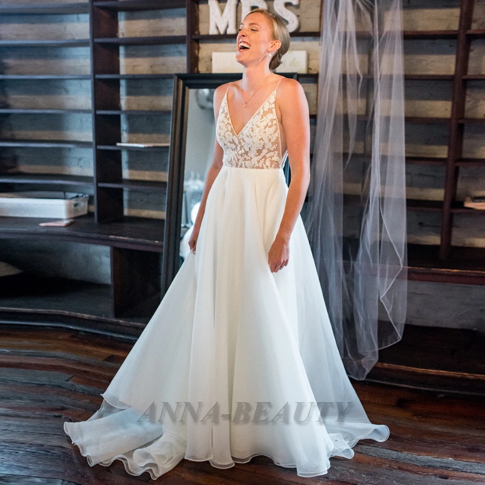 

Anna Simple Illusion Wedding Dresses V Neck A Line Sleeveless Backless Appliques Tulle Spaghetti Strap Robe De Mariée Customised