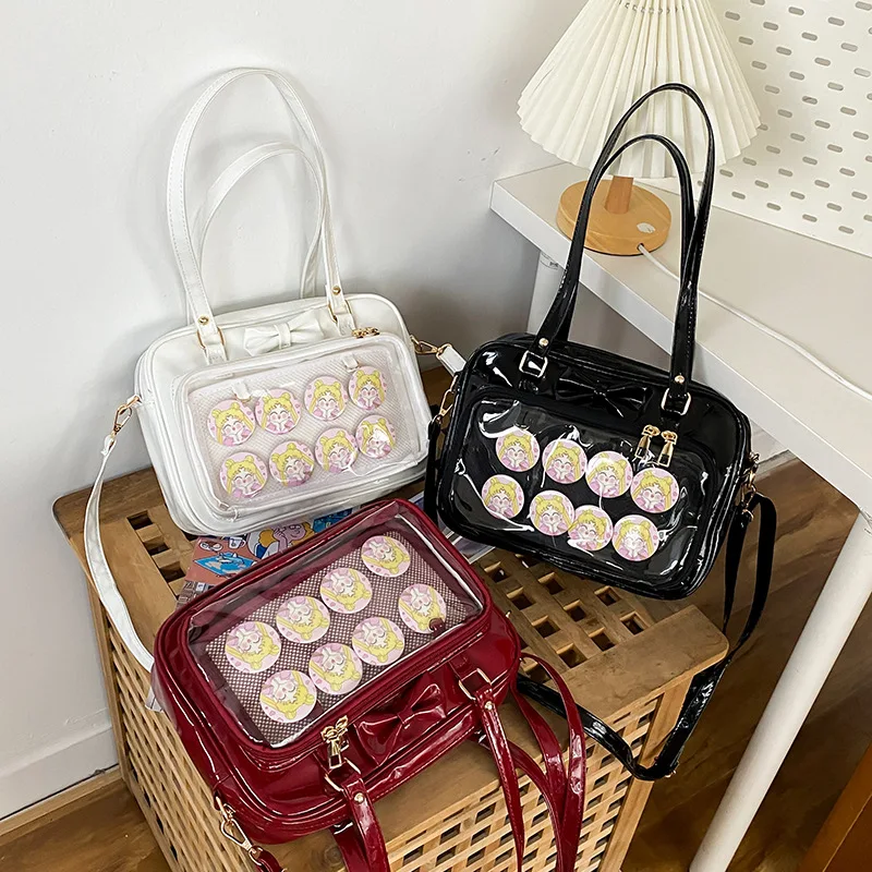 

Japanese Transparent One Shoulder Pain Bag Women's Bag Handheld Crossbody Bag Patent Leather Soft Girl Bag Cute Bow