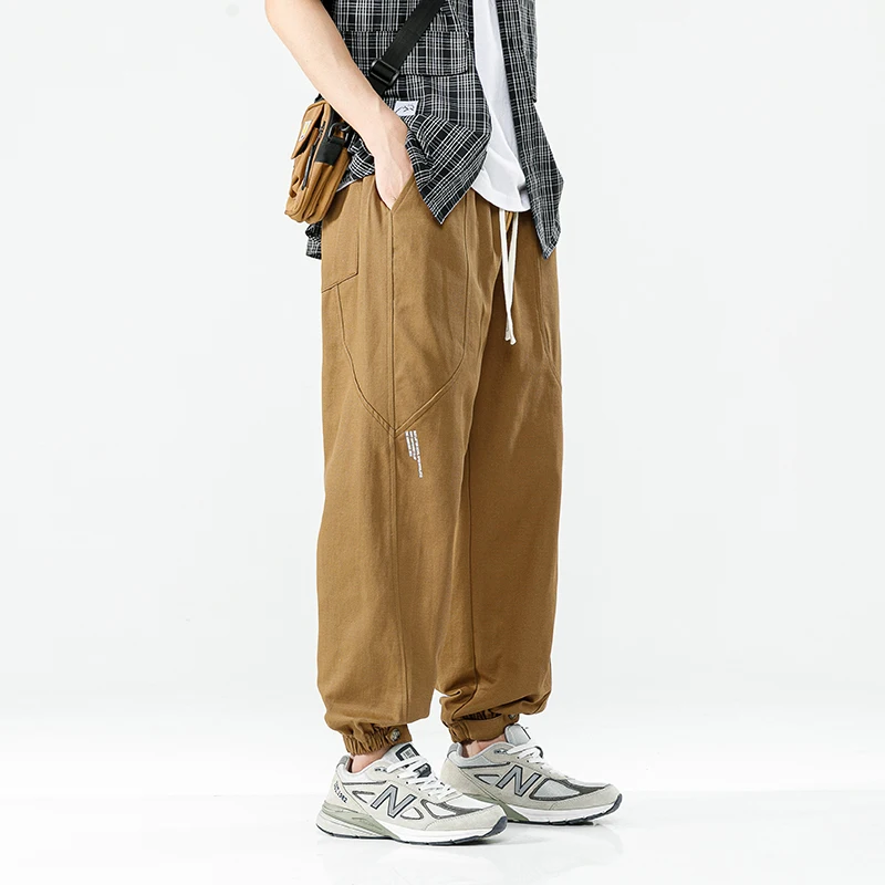 

Брюки-карго мужские с широкими штанинами, повседневные спортивные штаны в стиле хип-хоп, корейский комбинезон в стиле Харадзюку, осенние брюки, модель 5XL
