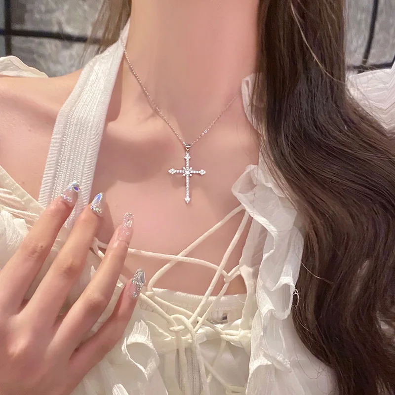 

Diamond-studded cross necklace