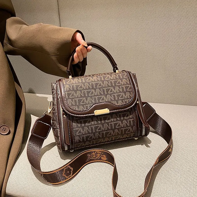 2023 Summer Fashion soft leather hand bill shoulder large capacity women's bag