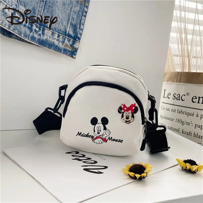 

Disney cartoon Fashion Mickey mouse canvas small bag girl new ins Japanese diagonal wild student shoulder mobile phone bag