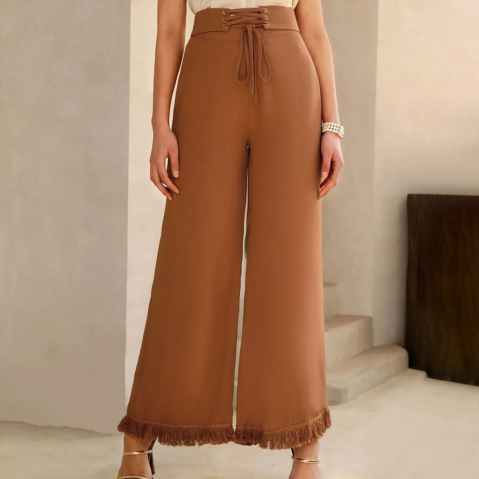 

Однотонные расклешенные брюки, женские повседневные облегающие брюки со шнуровкой, длинные широкие брюки до щиколотки с кисточками на подоле