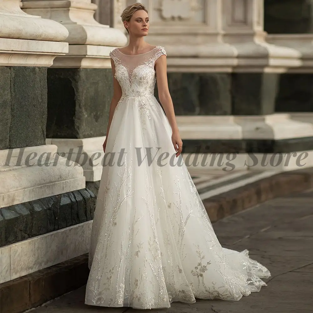 

Boat Neck Classic Wedding Dress with Short Sleeve Court Train Backless and Applique Sequins Beads Pearls 2023 for Brides