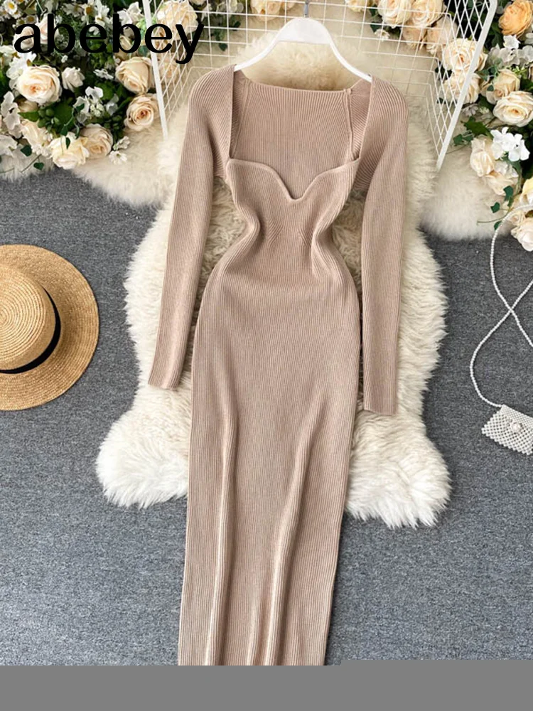 

Женское трикотажное платье-свитер средней длины, без бретелек