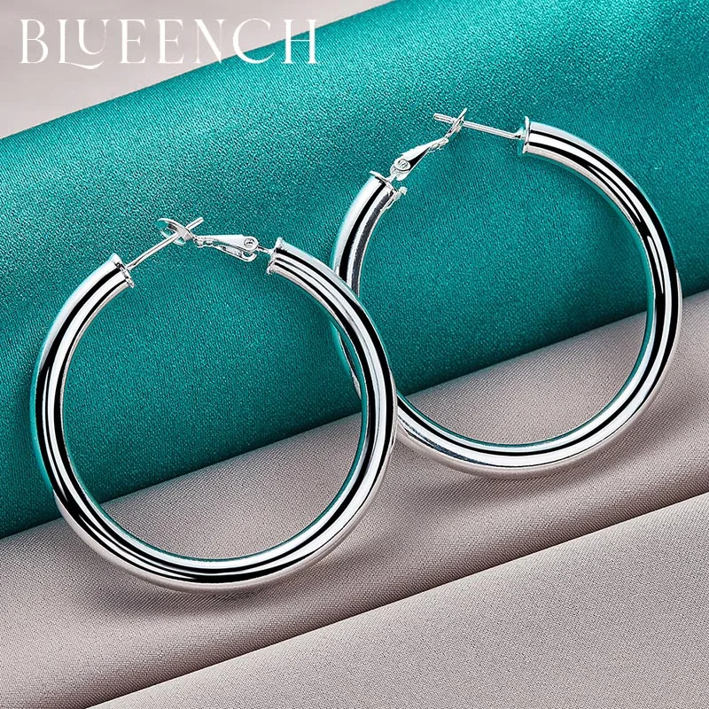 Женские серьги из серебра 925 пробы с круглой подвеской