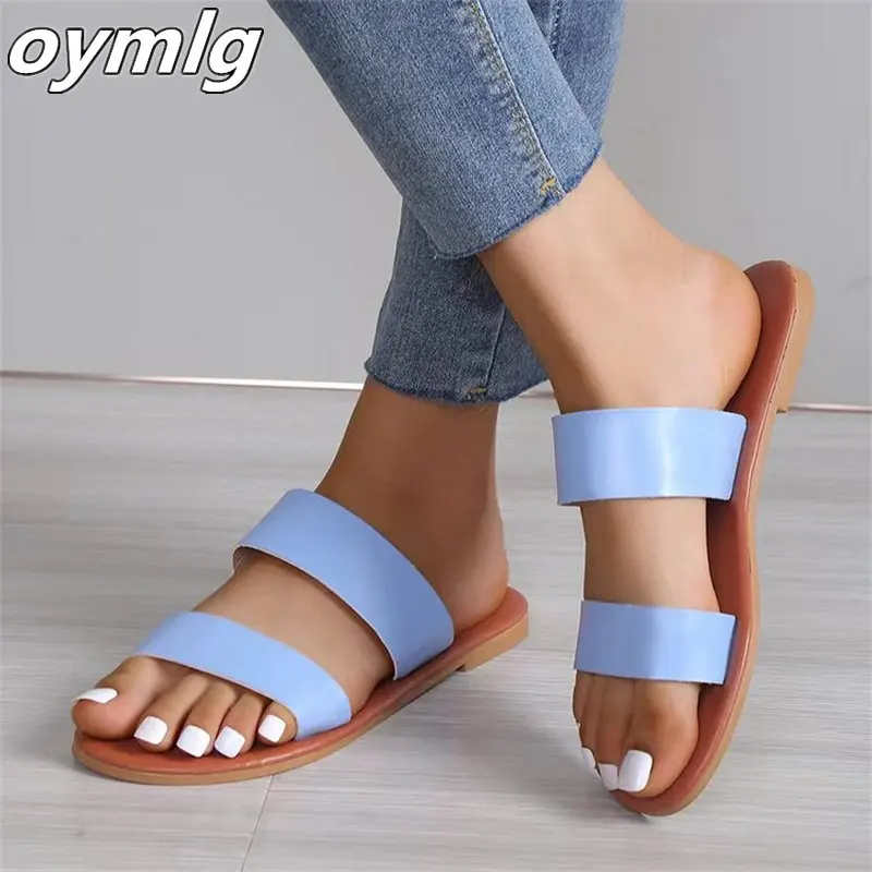 

Sandals for women 2023 summer new large flat flat shoes with a word outside the beach sandals wholesale in stock