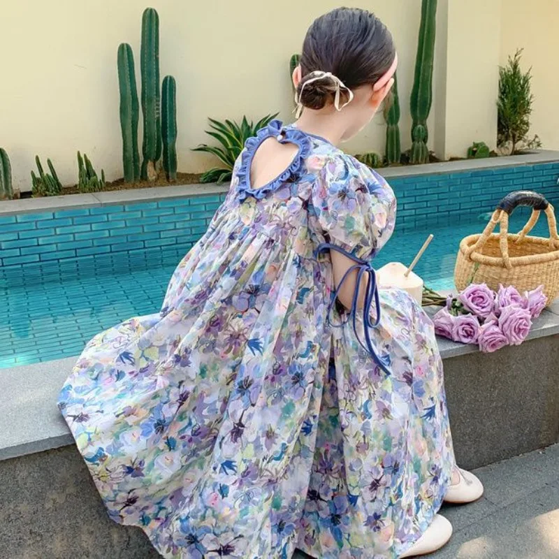 Женское летнее платье с открытой спиной и коротким рукавом