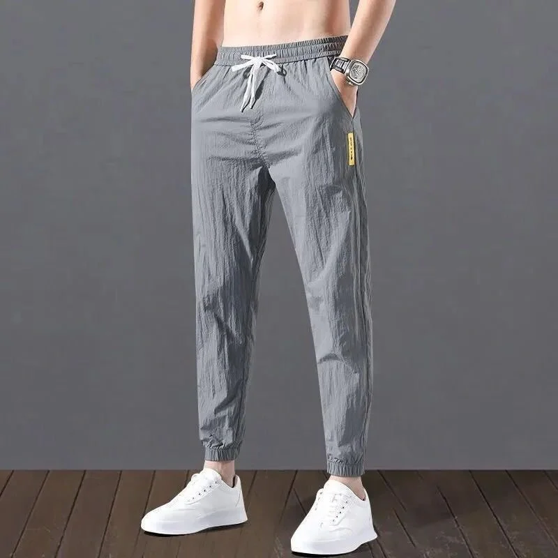 

Ice Silk Casual Sports Men's Summer Thin Drawstring Elastic Waist Nine Points Pants Quick Dry Trendy Slim Trousers Men New