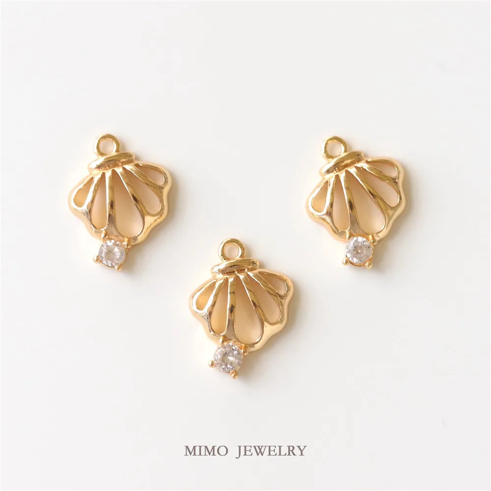 

Color copper plated gold micro-inlaid zircon hollow shell pendant ocean wind DIY handmade accessories