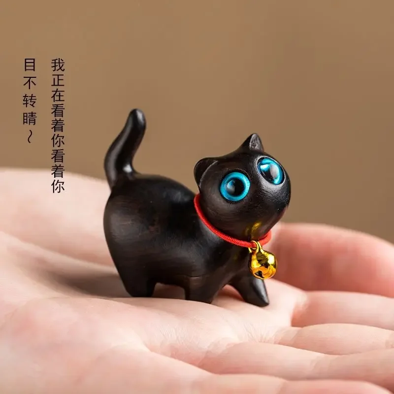 

Деревянная статуэтка кота