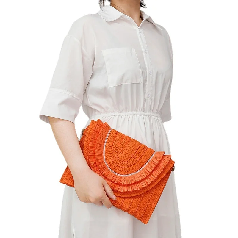 

Women New Holiday Woven Bag Female Paper Grass Small Handheld Bag Vacation Sea Straw Letter Sealing Bag Wholesale