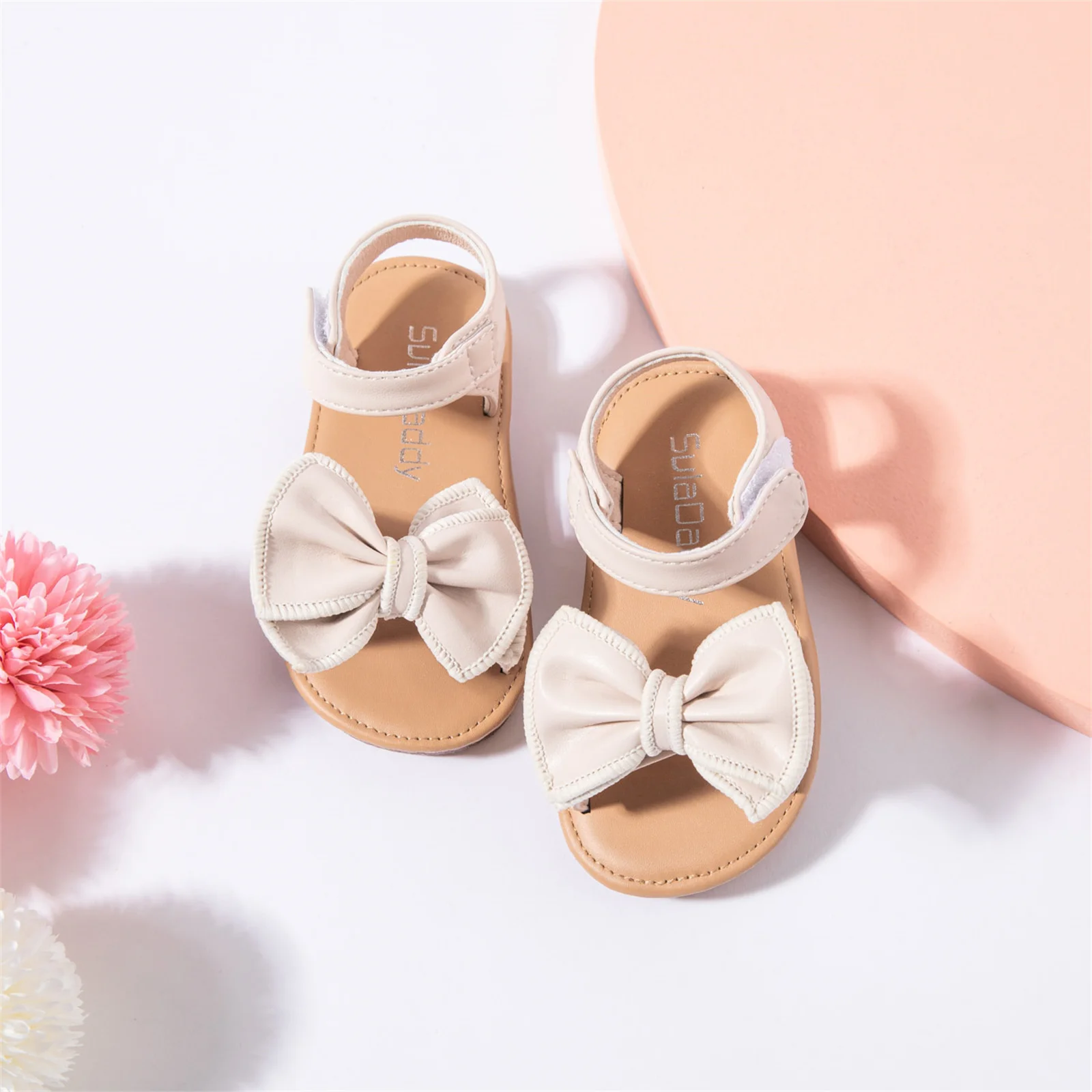 

Сандалии с бантом и открытым носком