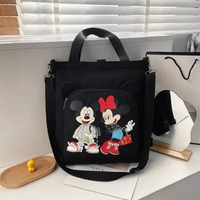 

Disney cute Mickey print ladies all-match large-capacity one-shoulder messenger canvas bag student casual schoolbag tutoring bag