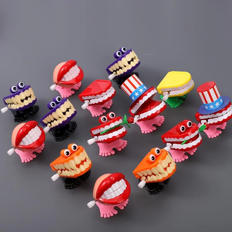 

Clockwork Toy Upper Chain Jumping Tooth Toy Children Jump Teeth Running Clockwork Spring Wind Up Toy Halloween Christmas Gift