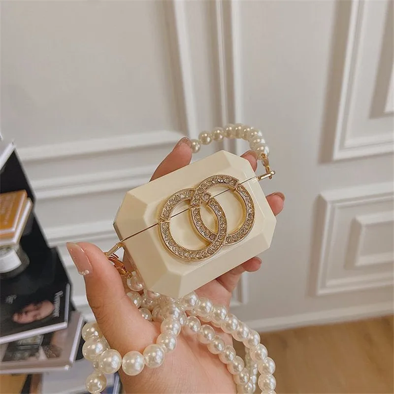 Женская мини-сумка через плечо с жемчужинами