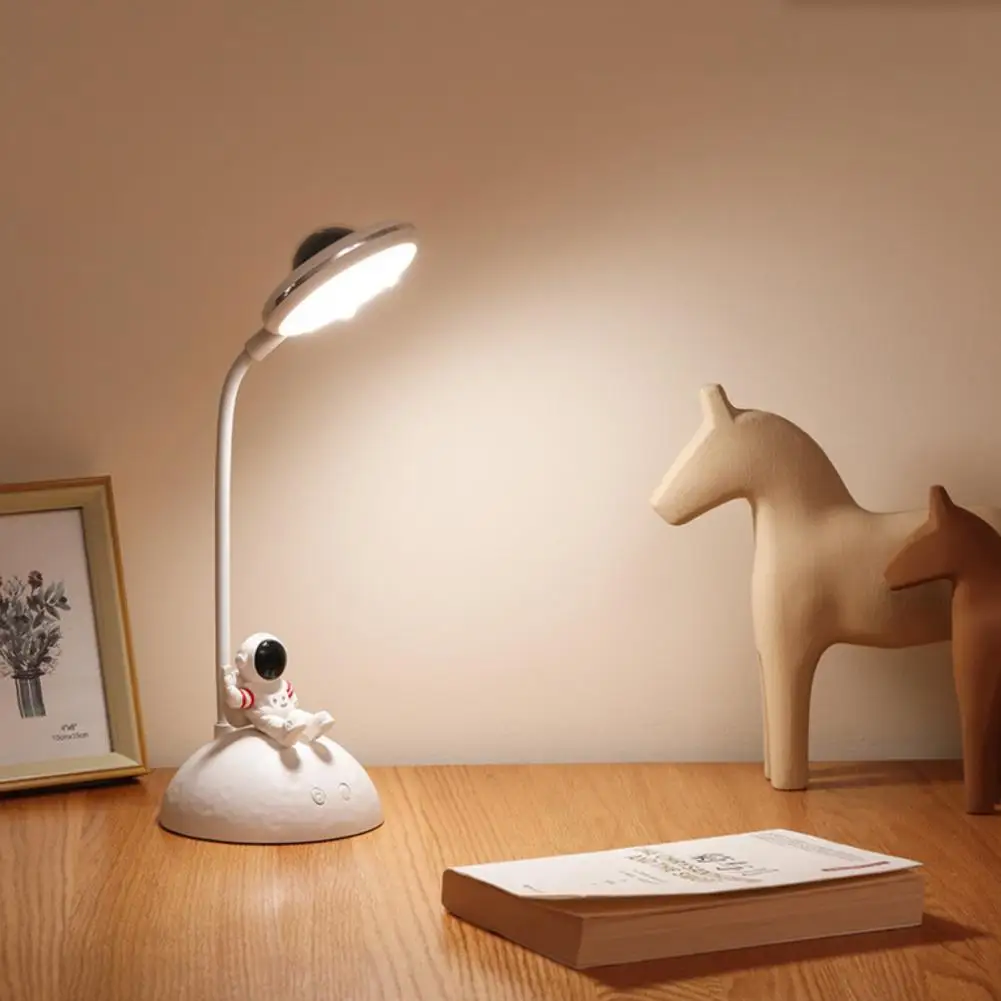 

1 Set Desk Lamp Creative Shape 180 Degree Adjustable Non-Glaring High Brightness Energy-saving Illumination ABS Cartoon Astronau