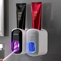 ecoco wall mount automatic toothpaste dispenser bathroom accessories set toothpaste squeezer dispenser toothbrush holder tool