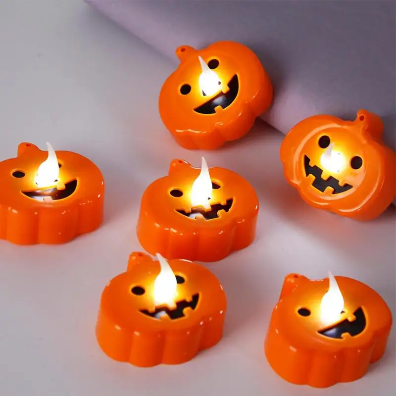 

12Pcs Halloween Pumpkin Flameless Candle Battery Operated LED Tea Light Flickering Pumpkin Lamp Halloween Party Props