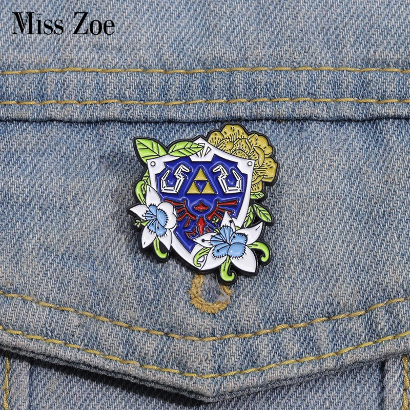 

ZELDA SHIELD Enamel Pins Custom Game Element Blue Shield Brooches Lapel Badges Cartoon Funny Jewelry Gift for Kids Friends