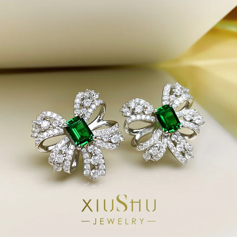 

Explosion Flash 1 Carat Artificial Emerald Earrings Bow Knot 925 Sterling Silver Imported High Carbon Diamond Colombian Diamond