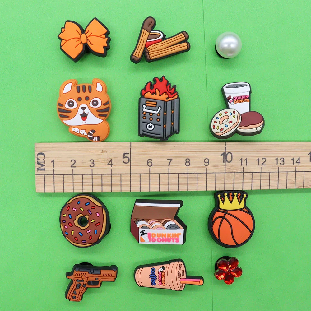 

1-12PCS PVC Cartoon Shoe Charms Donut Basketball Tiger Bow Pearl Flower Gun Cookie Croc Slipper Accessories Decoration Buckle
