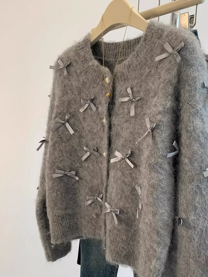 Женский вязаный кардиган с бантом