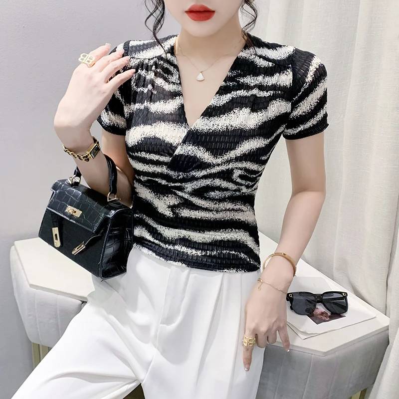 

Show Off Your Style with Our 2023 Summer Collection: Fashionable Camouflage Leisure T-shirt for Women V Neck Sexy Top Korea