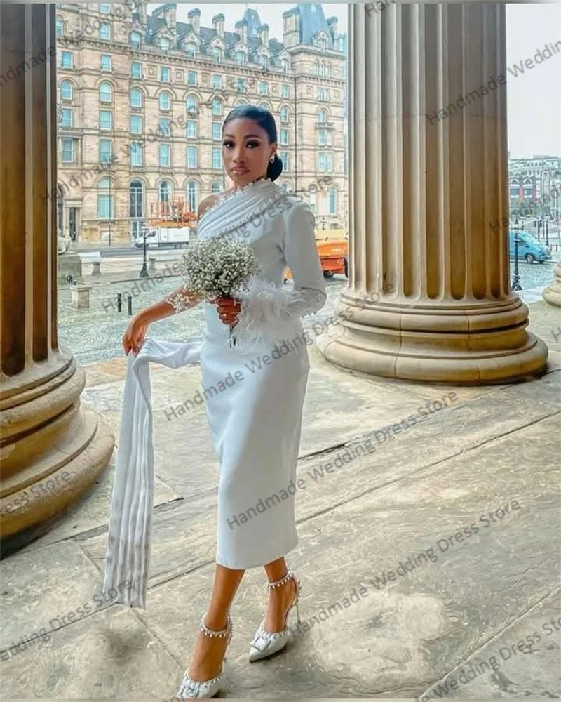 Фото Роскошное свадебное платье с перьями, сексуальное, без рукавов, с открытой спиной, ажурное, фасон «русалка», на заказ, для пляжа, сада, церкви, длинное. №4