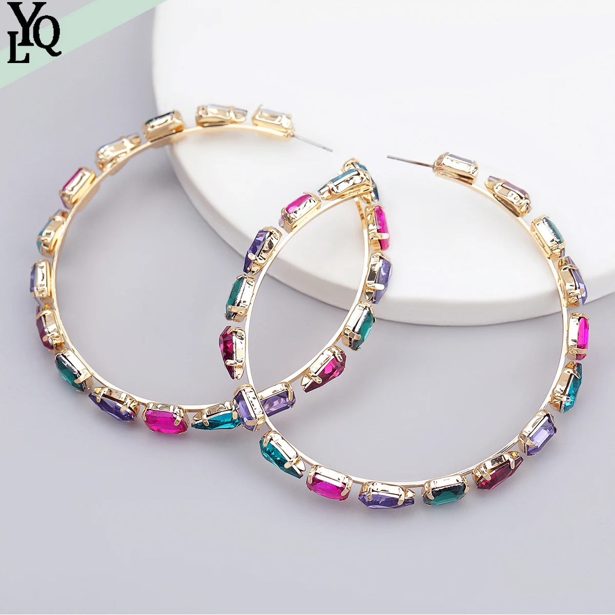 

Elegant and Luxurious Women's Large Earrings Adorned with Fashionable Accessories Such As Rhinestones