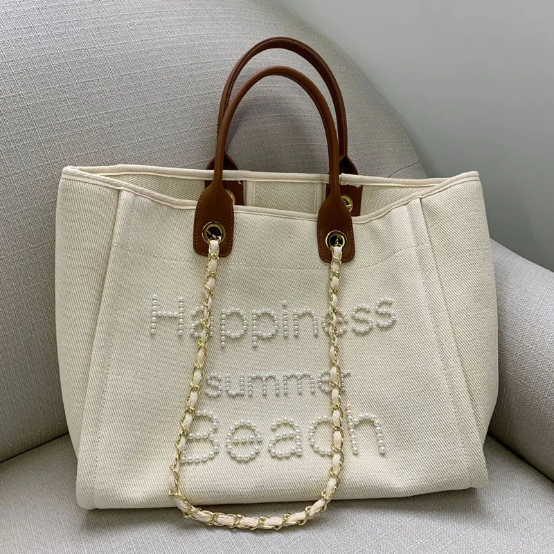 

2022 New Small Fragrance Canvas with Leather Handbag Luxury Design Chain Pearl Beach Bag Mommy Bag Shoulder Tote Women's Bag