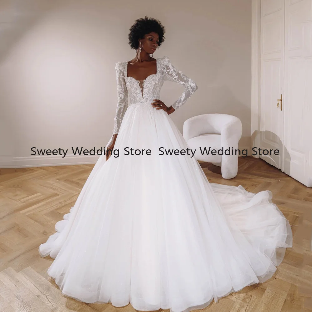 

Свадебное платье с длинным рукавом, блестящим бисером и блестками