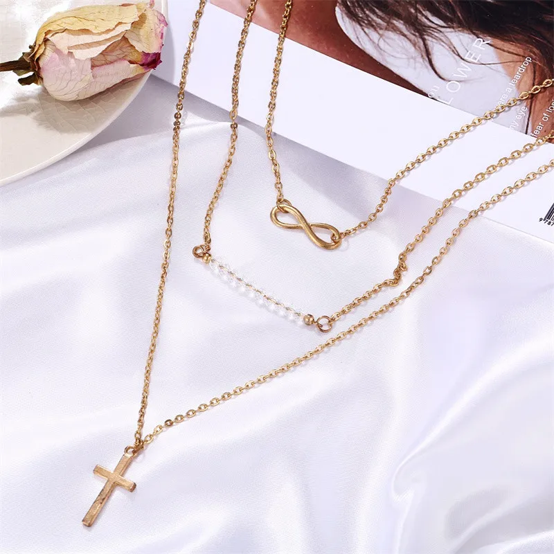 

Hot Selling Luxury Trend Multi-layer Female Necklace Simple Temperament Infinity Symbol Cross Rice Beads Jewellery Birthday Gift
