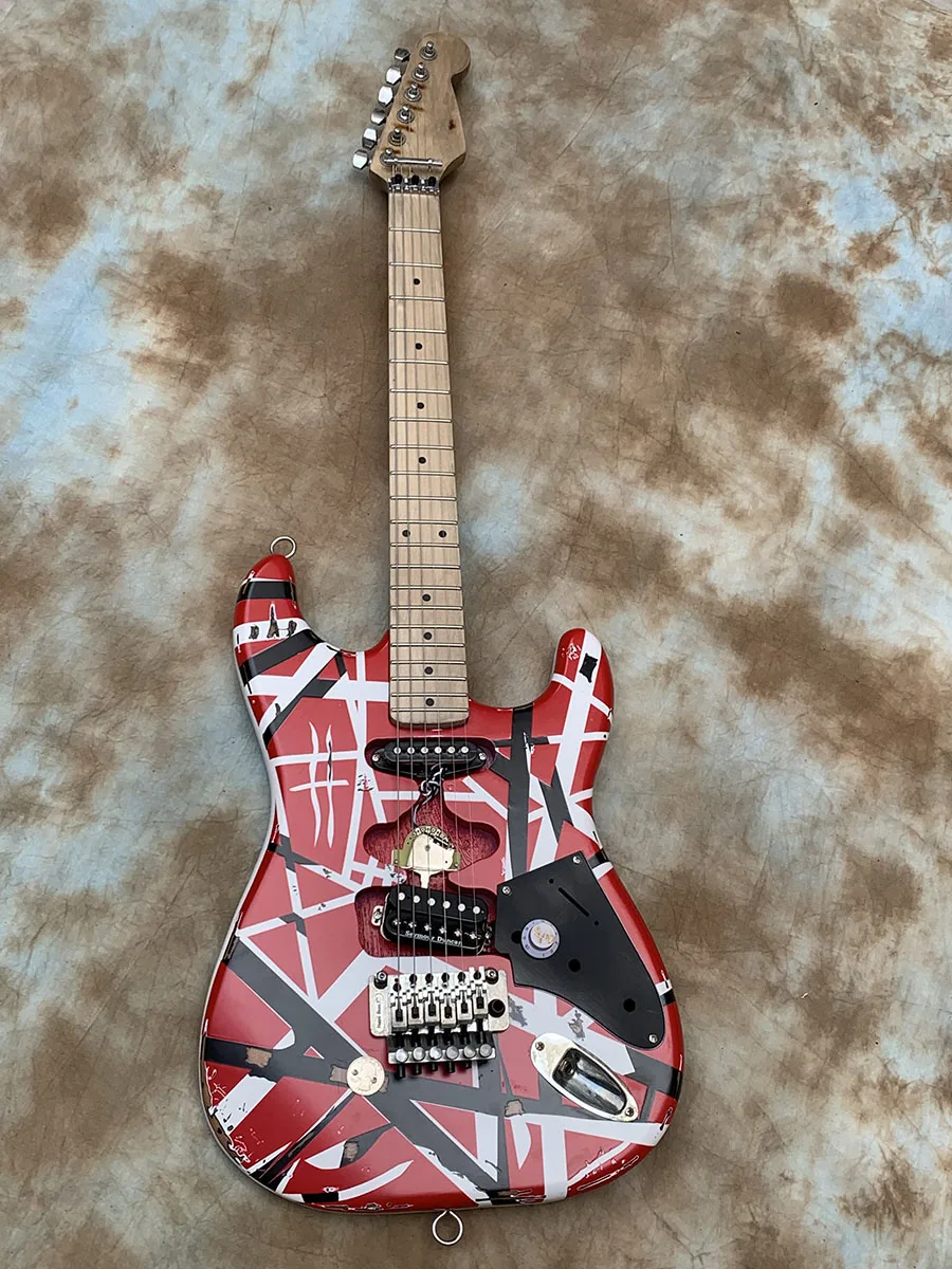 

Aged/Relic, Frankenstrat, Frankie Striped, Wine Red, Double Locking Tremolo