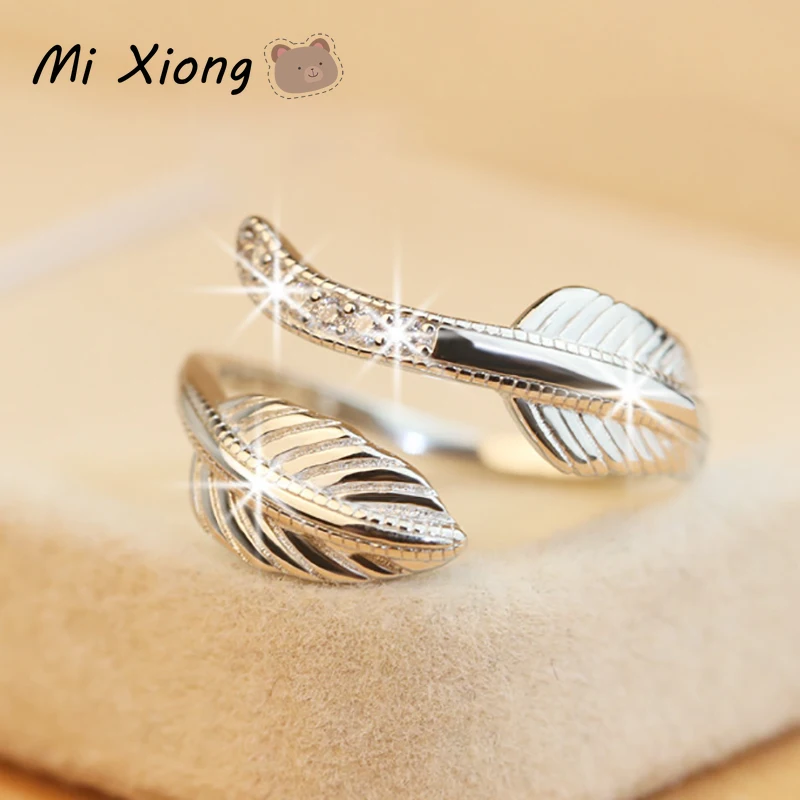 

Mi Xiong s925 sterling silver ladies ring unique leaf micro-inlaid crystal exquisite elegance charm anniversary brand jewelry