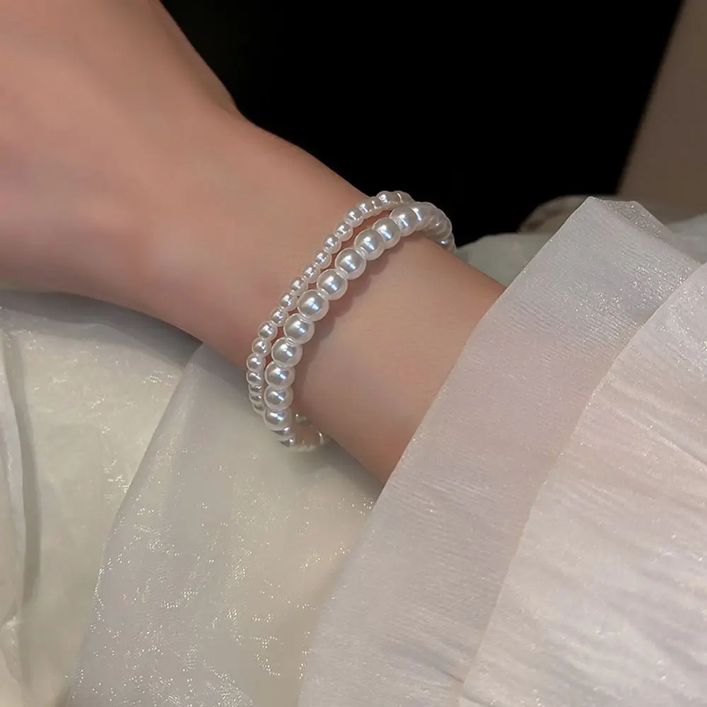 

Elegant French Pearl Elastic Bracelet Temperament Sweet Fashion Exquisite Jewelry Simple Retro Luxury Wrist Chain Wholesale