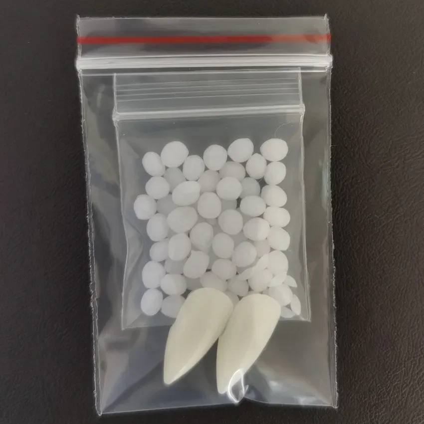 

Резиновые клыки для костюма вампира